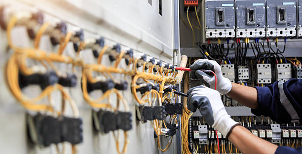 Professional Electrician technician working in Juno Ridge, FL